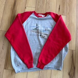 Mickey Inc. vintage sweatshirt with a Myrtle Beach, S.C. lighthouse graphic.